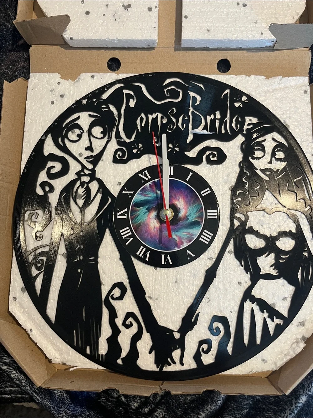 Black Tim Burton Style Wall Clock made from a record with Colorful Dial